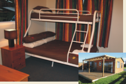 The Cabin's bunk room with queen and single beds The Cabin's bunk room with queen and single beds
