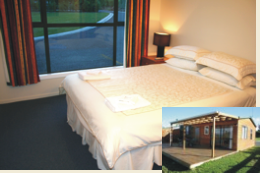 Queen Room in separate cabin bach Queen Room in separate cabin bach